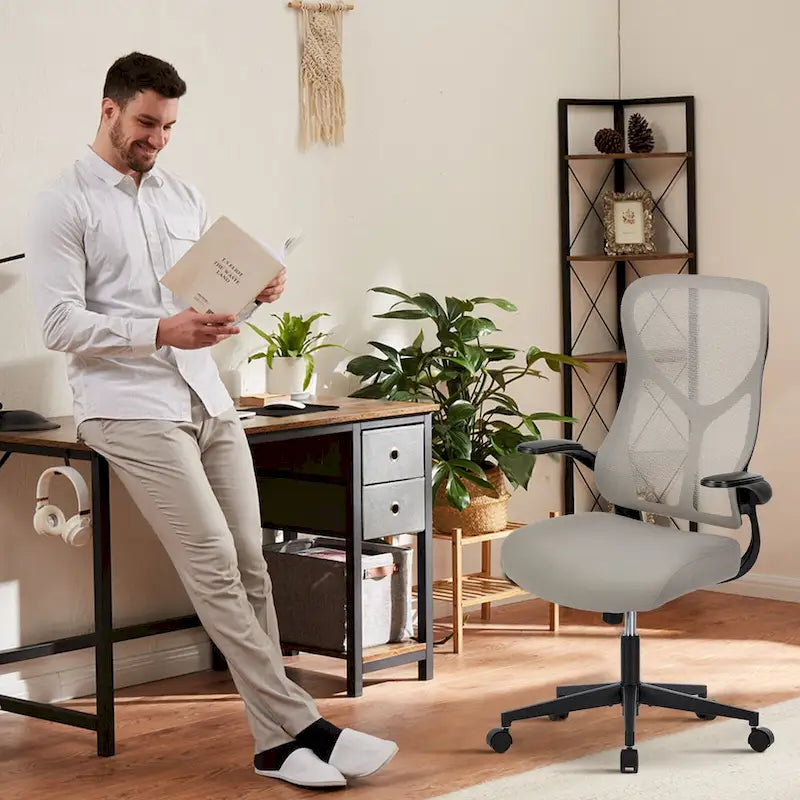 Wygodny, ergonomiczny fotel biurowy z regulowanymi funkcjami, zapewniający optymalne podparcie i odprężenie.